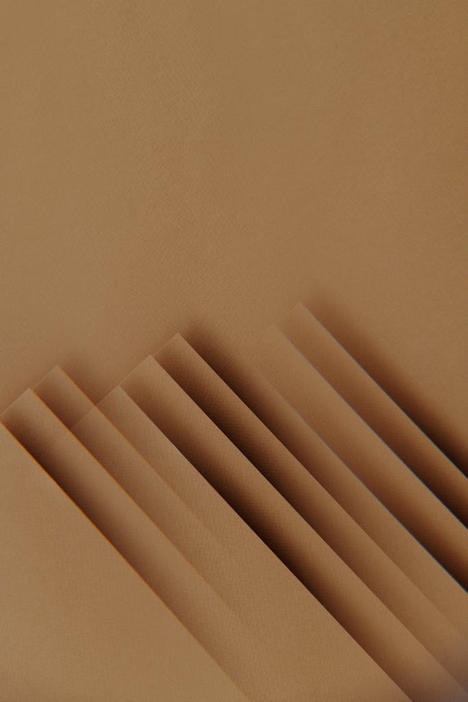A Minimalist Abstract Composition Featuring Layers Of Beige Paper In A Vertical Arrangement. 4252166 683x1024